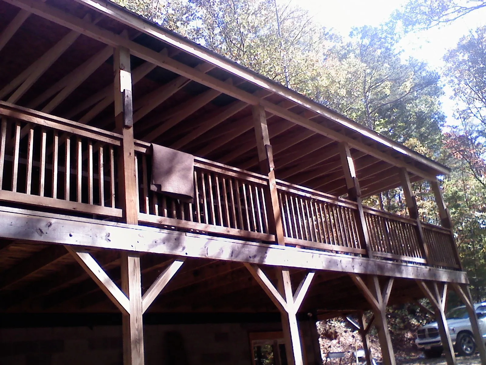 Timber framing under a new elevated porch and deck — Roof Leak Repair in Prinsburg by Roofing Brothers